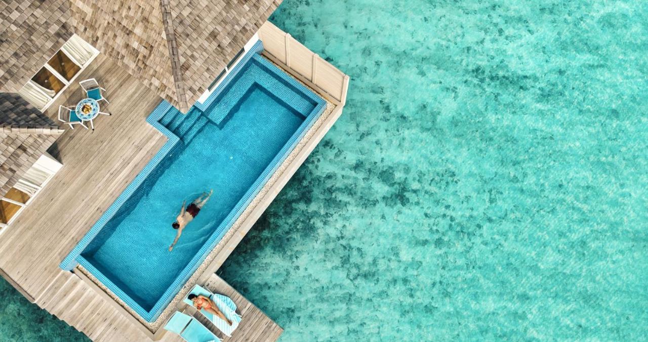 Kandima Maldives Kudahuvadhoo Eksteriør billede Aerial view of a pool at a resort in Maldives