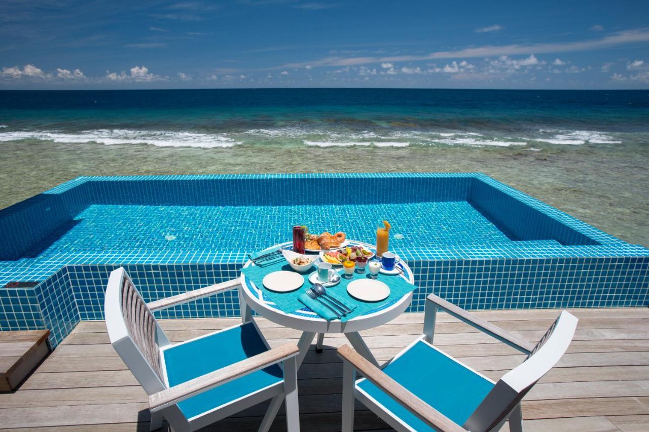 Kandima Maldives Kudahuvadhoo Eksteriør billede A pool at a resort in Maldives